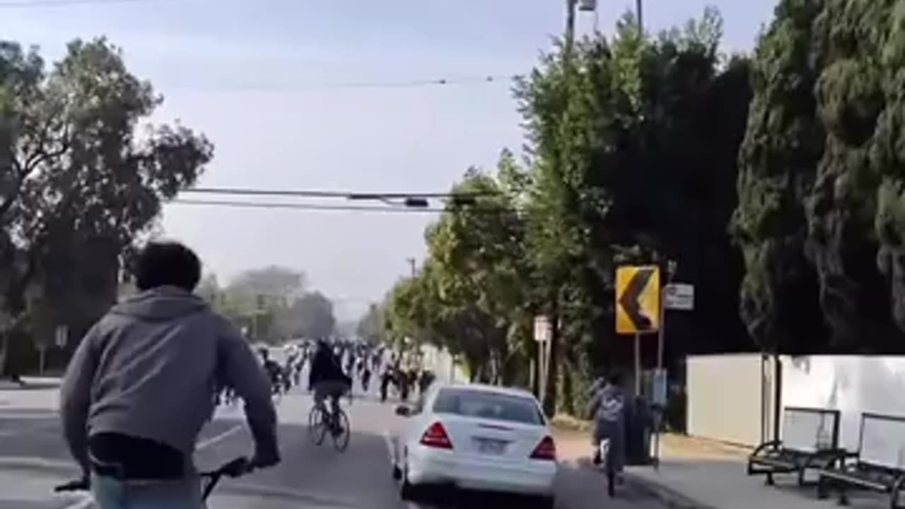 Psycho driver randomly drives through and almost hits 100+ bikers