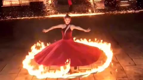 The Fiery Dance: A Stunning Performance of Fire and Grace!