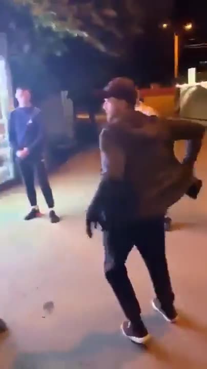 Guy uses a grenade at a fight