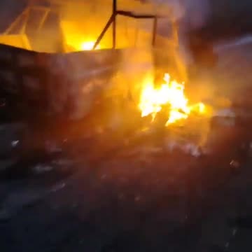 Russians Arive at Still Burning Transport Vehicle Hit by Drone