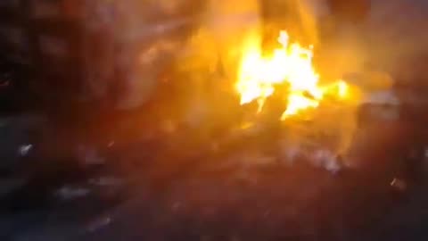 Russians Arive at Still Burning Transport Vehicle Hit by Drone