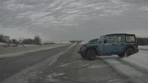 Jeep Loses Control on Slippery Road