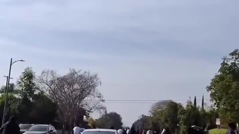[USA] Mercedes drives through bicyclists in LA.