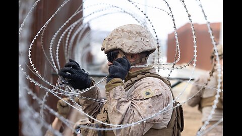 US Marines install concertina wire on the southern border wall in California