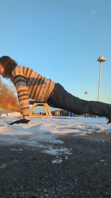 Doing spiderman pushups