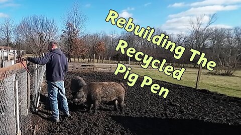 Fixing up the big pig pen.