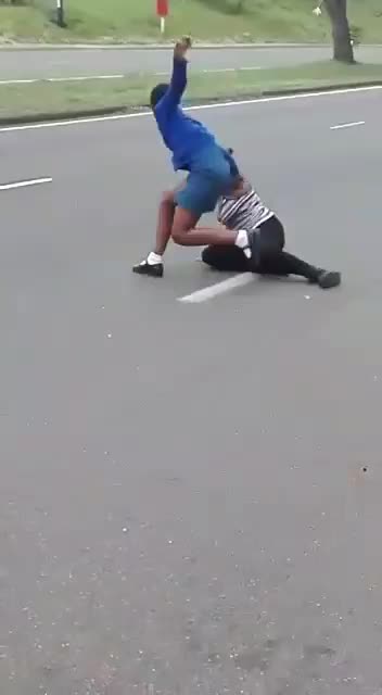 A wife attempted to confront her husband's side chick, but the side chick fought back