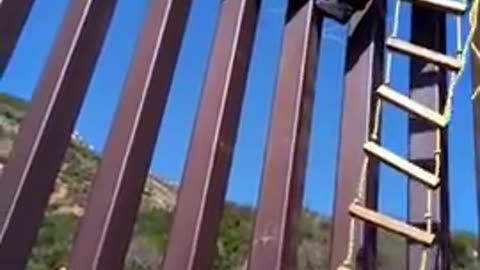 legal Invader Installs a makeshift Ladder at the U.S Border