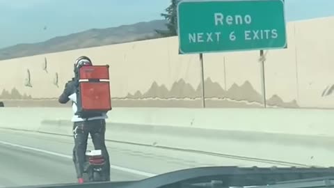 Man Rides Electric Unicycle On Freeway