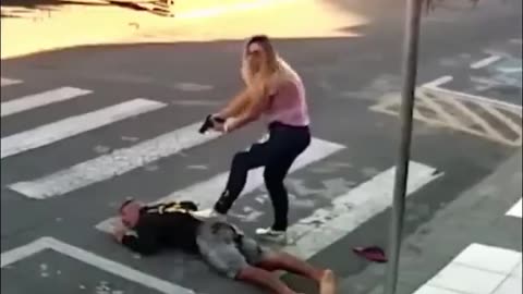 Woman stops man with gun