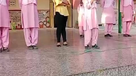 Little girl singing in front of all