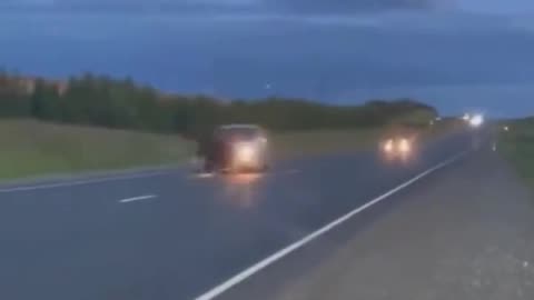 Moose Runs On Highway, Slips, And Is Launched Into The Air Like a Ragdoll