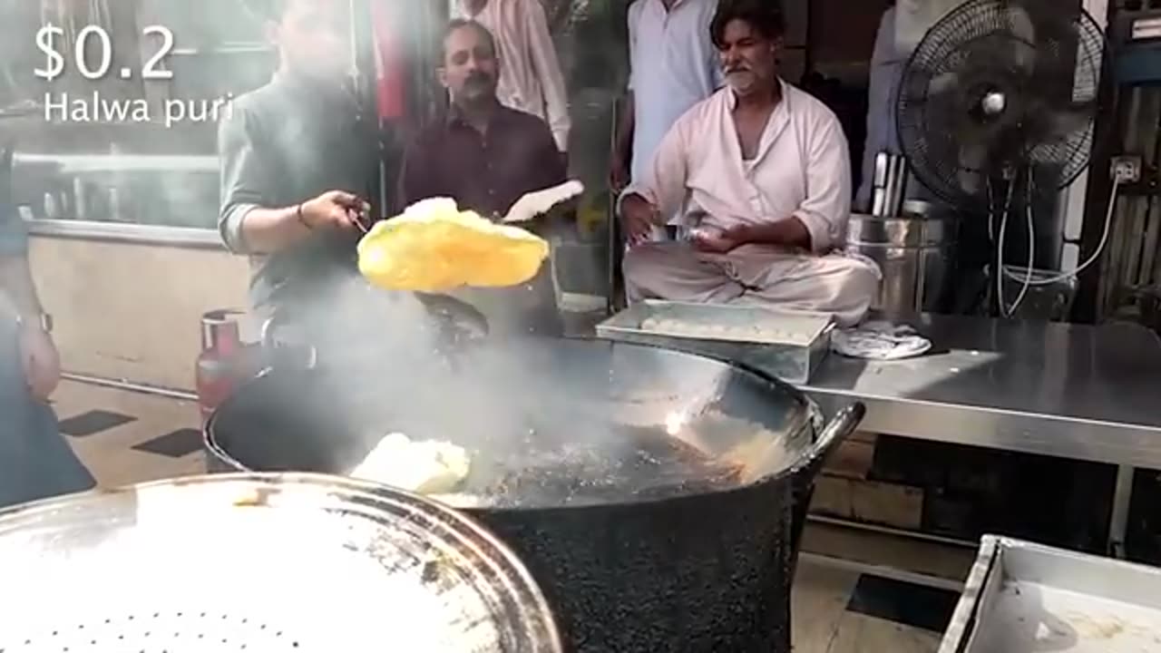 Vlog of a day eating street food for $1 in Pakistan