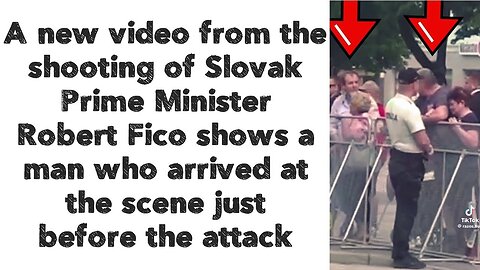 Slovak Prime Minister Robert Fico shows a man who arrived at the scene just before the attack