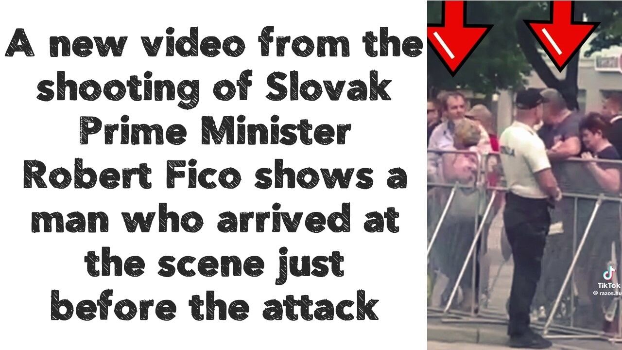 Slovak Prime Minister Robert Fico shows a man who arrived at the scene just before the attack