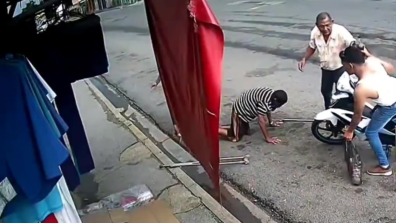 A person hits someone with crutches