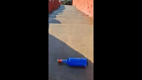 Breaking Bottle of Glass