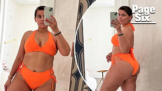 Makeup-free Nelly Furtado poses in orange bikini to celebrate 'new levels of self-love'