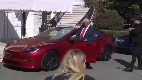 President Donald J. Trump jumps into his brand new Tesla!