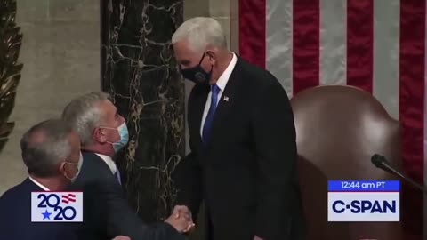 J6 Pence receives coin on 1/6/2021