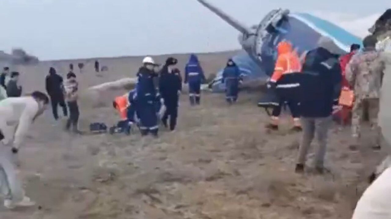 Man Films From Inside Doomed Kazakstan Plane Moments Before Impact, Seen Walking Away From Wreckage