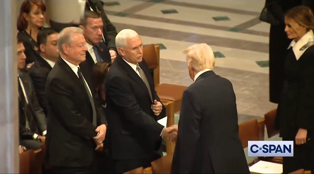 Trump and Mike Pence Shake Hands At Carter's Funeral Service