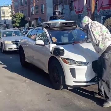 Self driving w- passenger car gets tagged by graffiti in San Francisco LOLOL