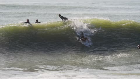 Surfer Wipeout Flips Backward