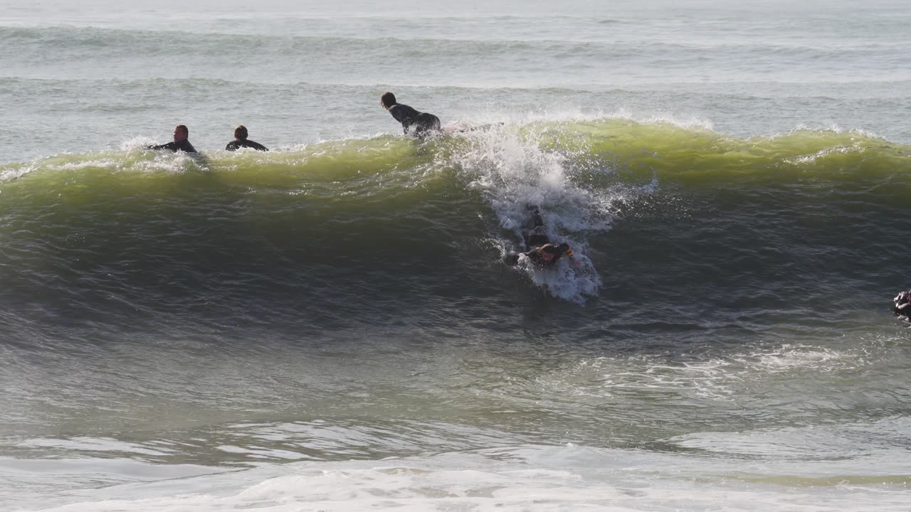 Surfer Wipeout Flips Backward