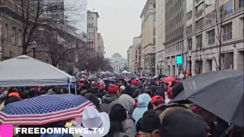 HAPPENING NOW🚨: Trump Supporters line up across multiple blocks under heavy rain