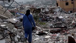 Lebanese woman returns to devastated village as Israel withdraws