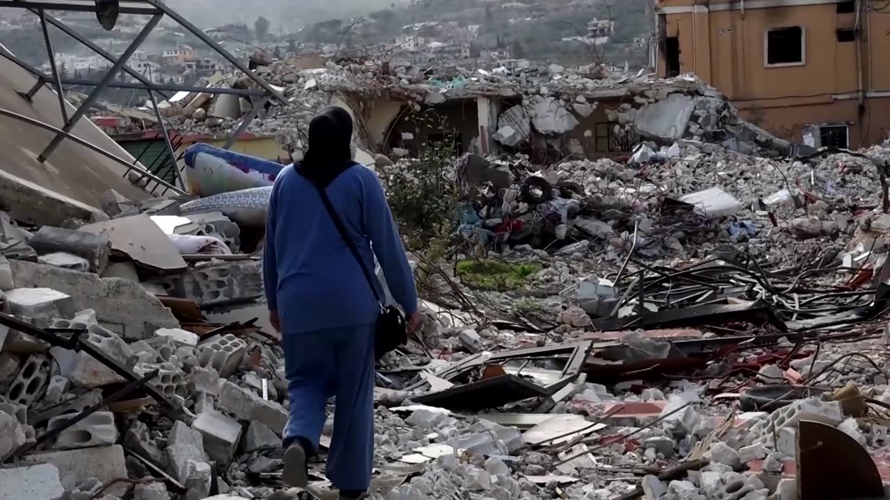 Lebanese woman returns to devastated village as Israel withdraws