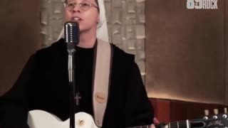 Catholic Sister of Rock is great on the guitar