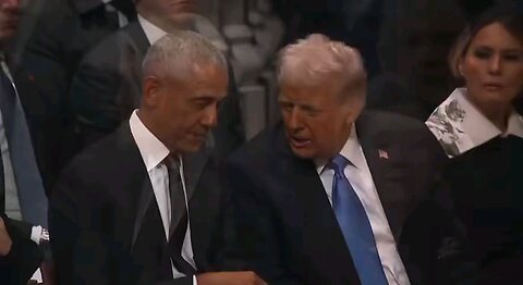 Obama chuckles as Trump whispers in his ear.