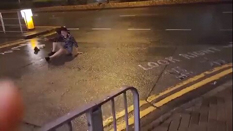 Hong Kong woman get wrecked by typhoon Saola