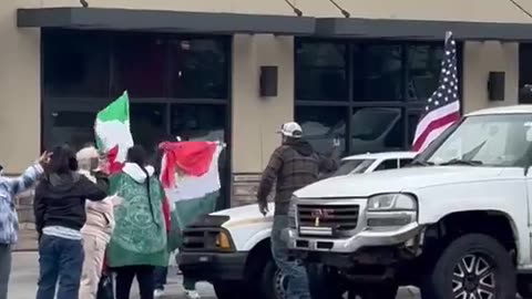 "Waving Foreign Flags to Demand Stay" — Protest Strategy Sparks Backlash at Immigration Rally