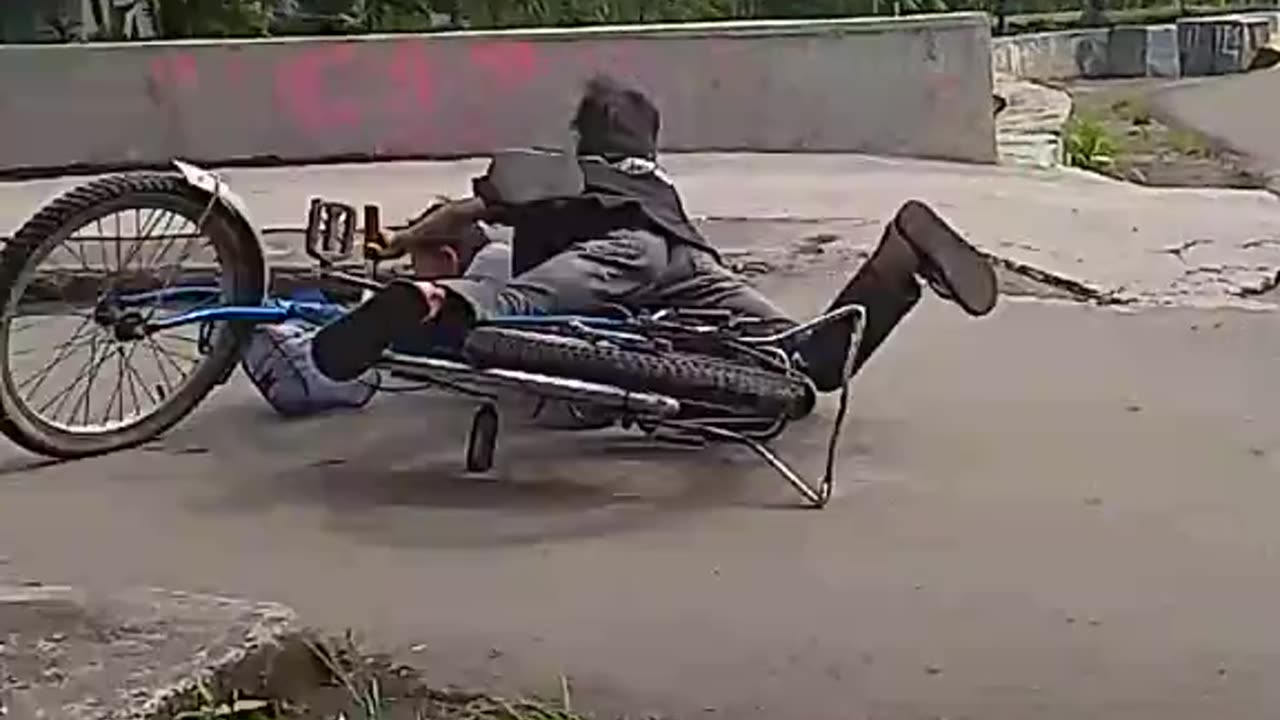 little boy fell off his bike