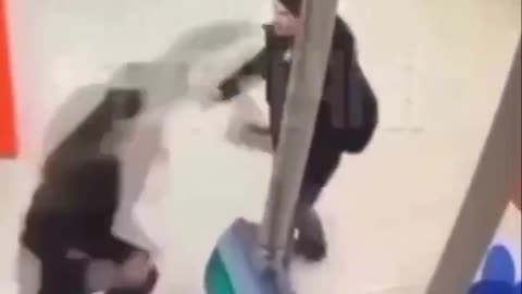 Man sucker punches security guard and gets spinning kick to the dome