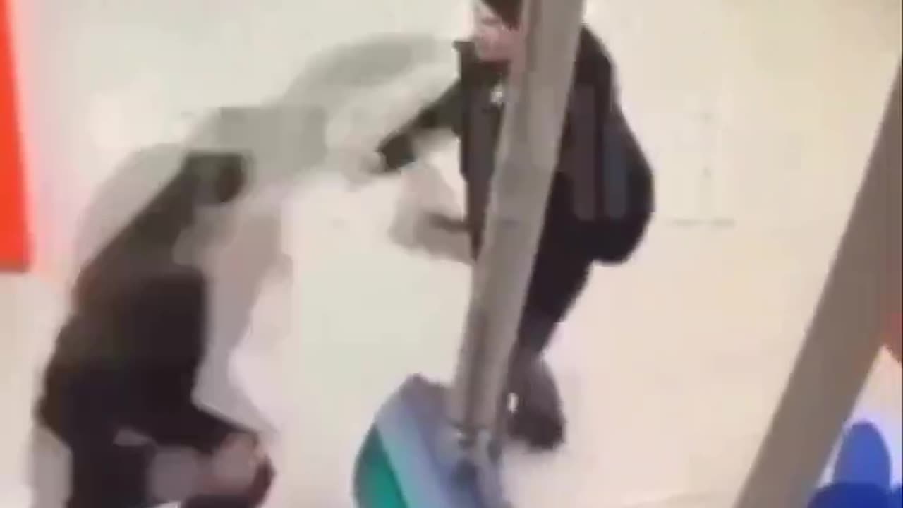 Man sucker punches security guard and gets spinning kick to the dome