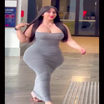 Sexy mature women walking on road