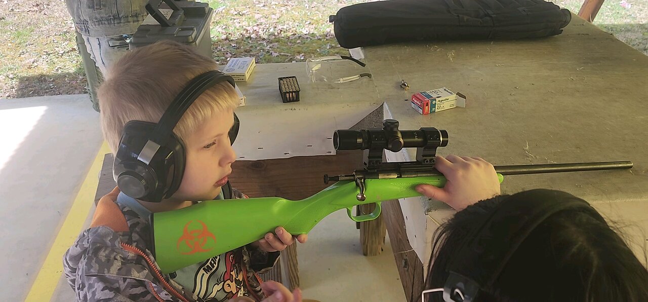Emmett learning to shoot