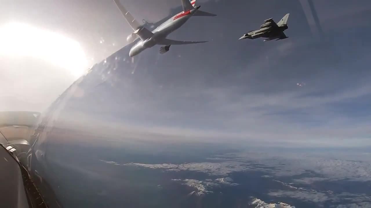 View from Italian Air Force fighter jet escorting American Airlines flight following