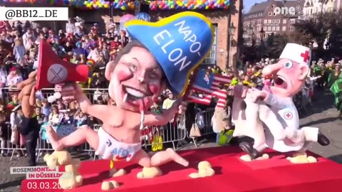 Elon Musk was shown today with a swastika in his hand at the carnival in Düsseldorf, Germany.