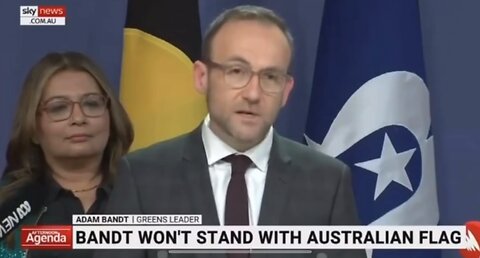 Australian Greens leader Adam Bandt removed the Australian flag during his press conference 🤡