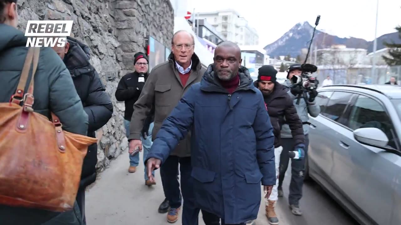 Ezra Levant & Avi Yemini of REBEL News chase down Blackrock CEO Larry Fink for 9 minutes in Davos (WEF).