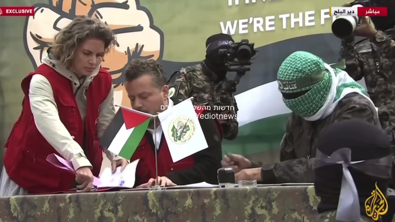 The cynical ceremony in which a senior member of Hamas's military wing signs