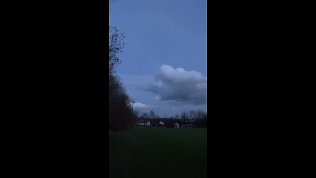 Strange orange light in sky