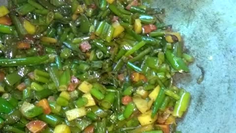 Onion sprouts fried with fresh beet potatoes