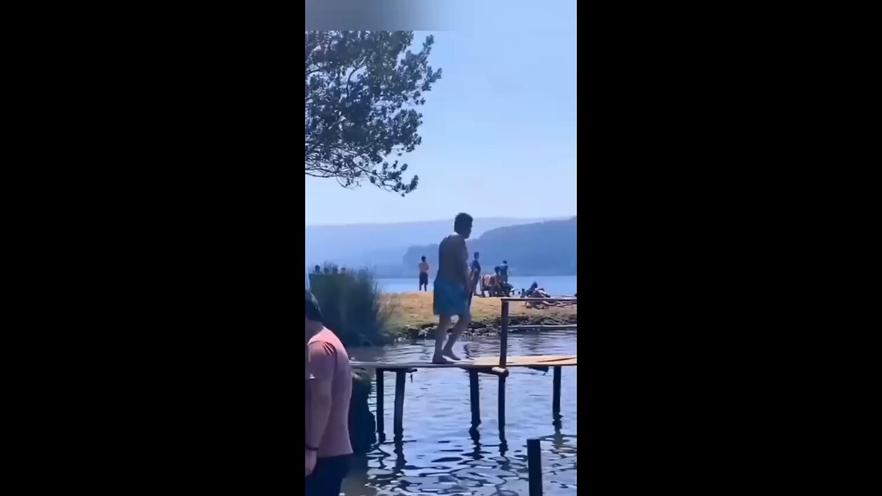 See how the man slipped and fell into the water