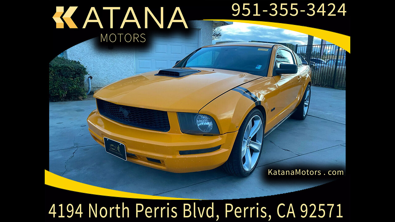 STOCK 667 - 2009 Ford Mustang Deluxe - Orange